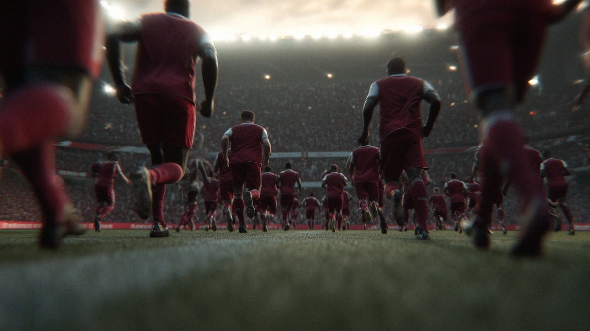 Arsenalspelare springer ut på planen